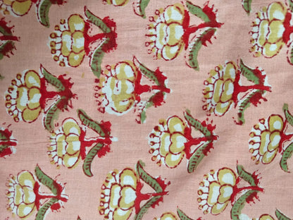 Zoomed-in view of peach kaftan fabric.