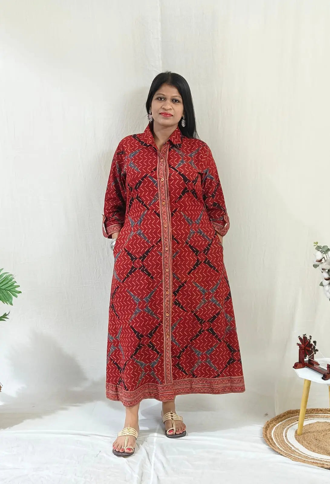 Shirt dress worn without tying the belt, styled casually with flats – front view.
