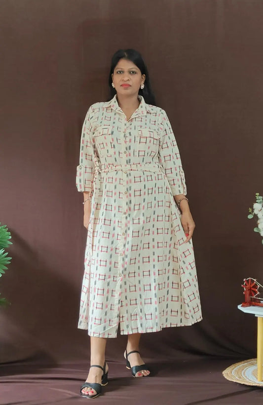 Front view – Resha double ikat shirt dress in handwoven cotton with attached belt and wooden buttons

