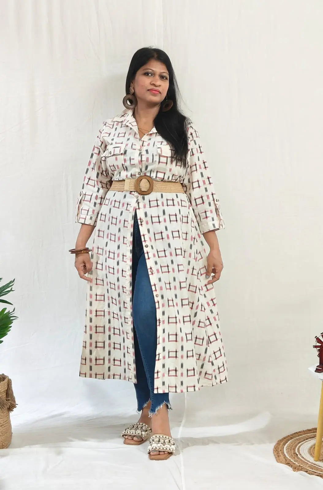 Front view half open with belt over jeans .