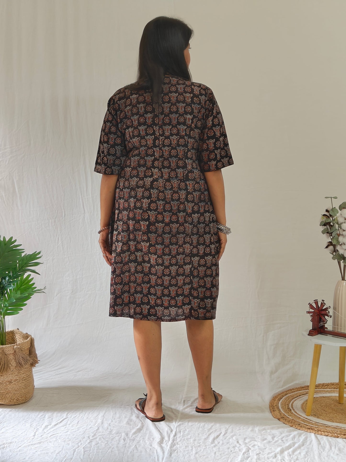 Back view: Black Ajrakh shift dress with pockets.