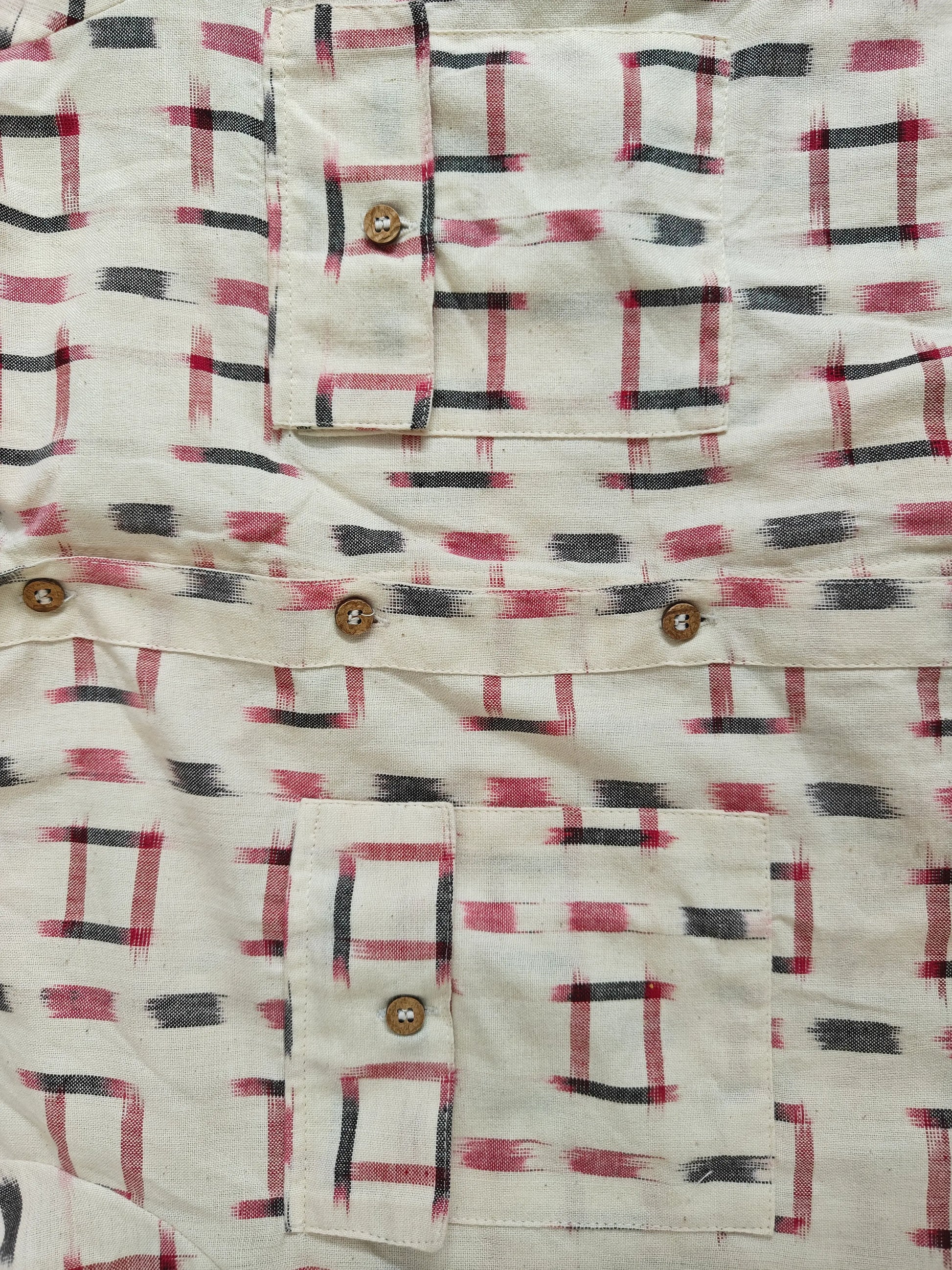 Zoom view of shirt showing front button detail and pocket design.