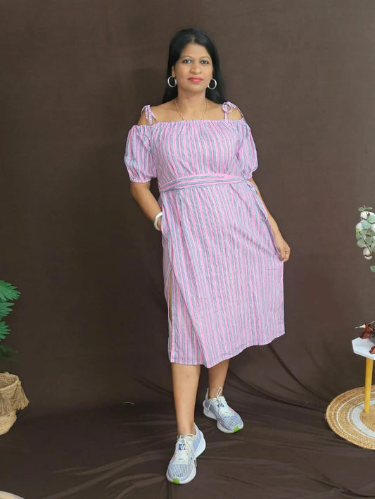 Pink striped off-shoulder dress with dori tie on shoulder, side slit and fabric belt — front view.