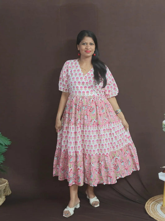 Rohini Tiered Dress – pink long tiered cotton dress with artisan prints, elastic sleeves, and breathable lining.