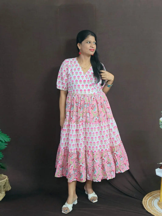 Rohini Tiered Dress – pink long tiered cotton dress with artisan prints, elastic sleeves, and breathable lining