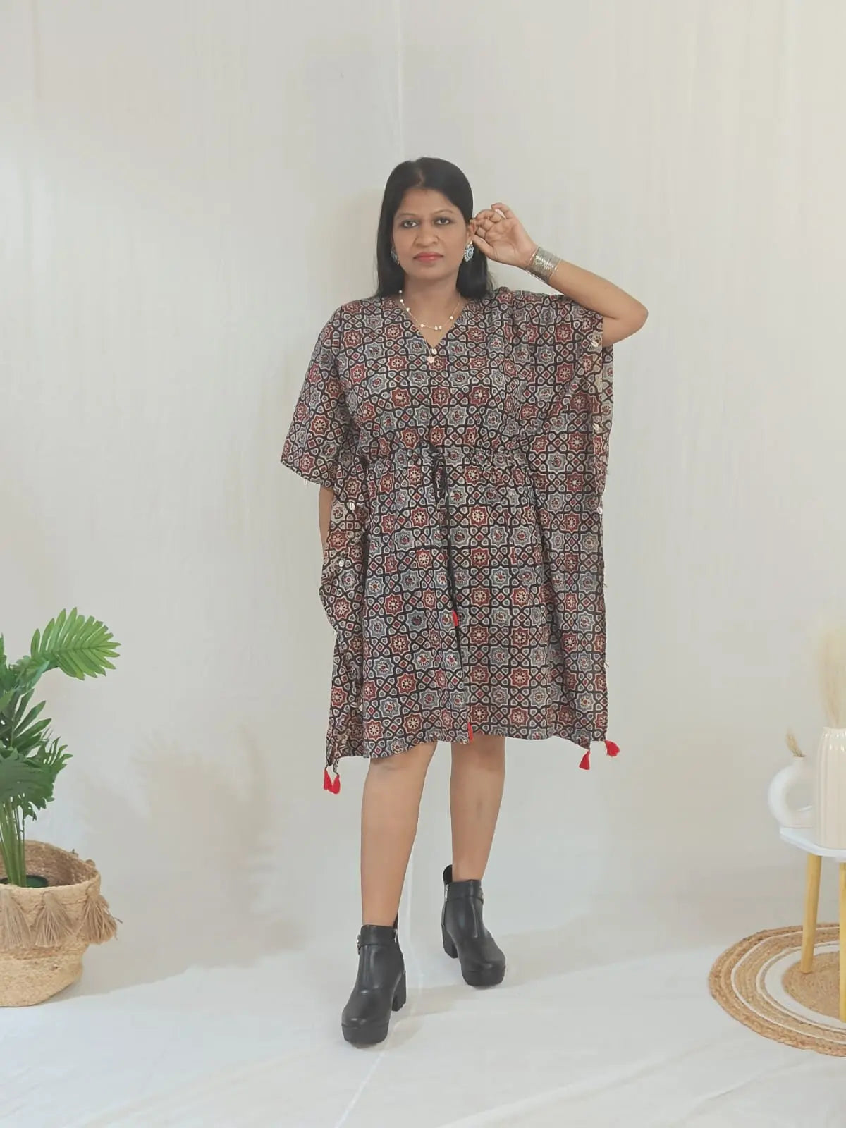 Kaari Ajrakh Blockprint Kaftan styled with ankle boots for casual chic look.
