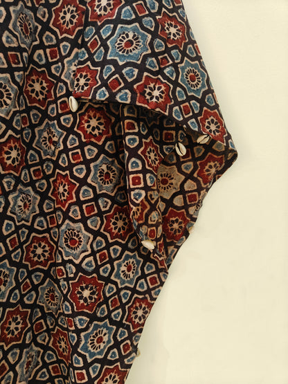 Close-up of Kaari Ajrakh Blockprint Kaftan showing shell detailing along seams.