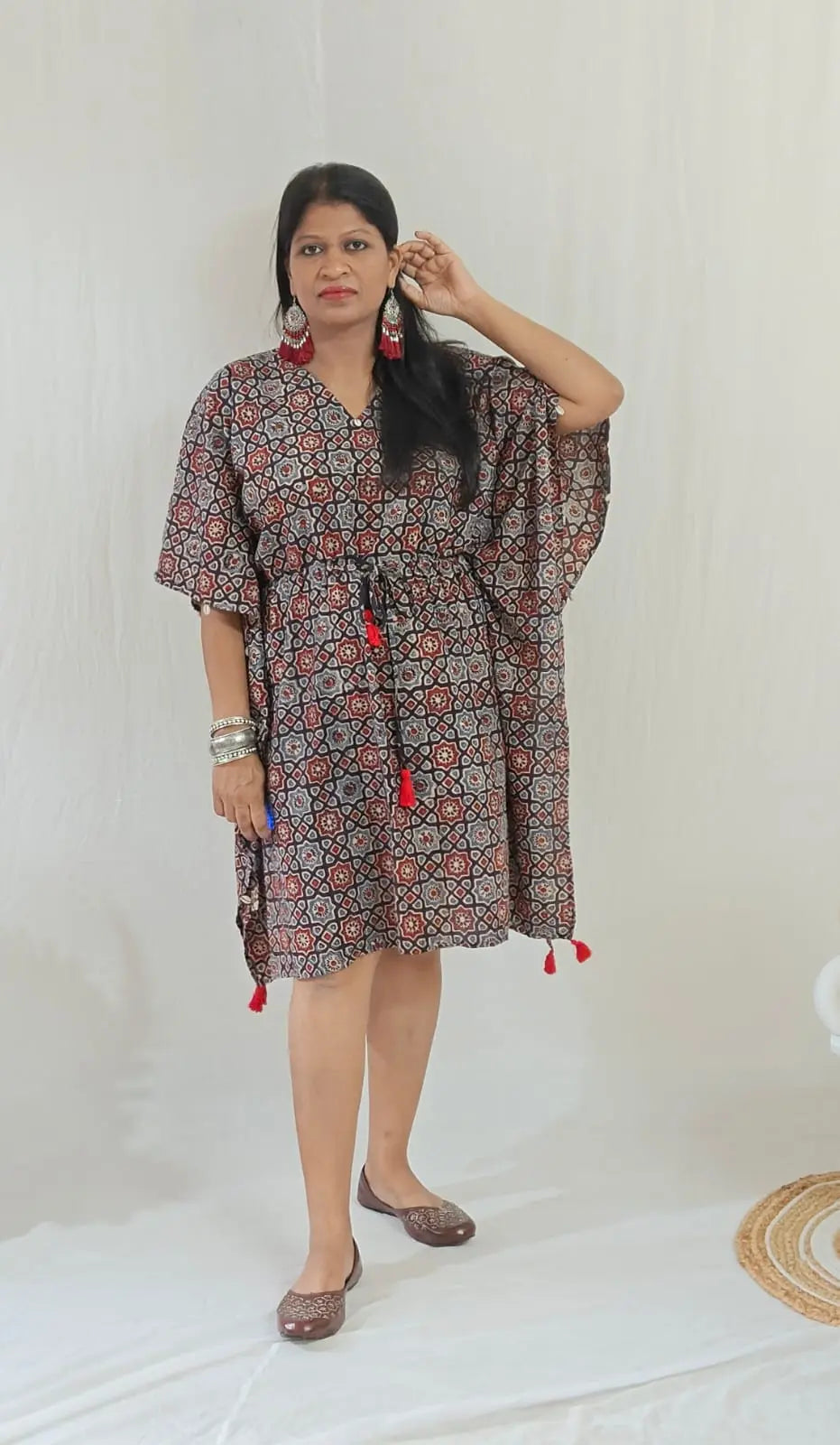 Kaari Ajrakh Blockprint Kaftan styled with oxidised chandelier earrings and traditional jutti