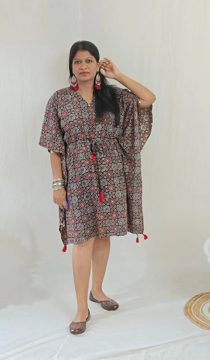 Kaari Ajrakh Blockprint Kaftan styled with oxidised chandelier earrings and traditional jutti