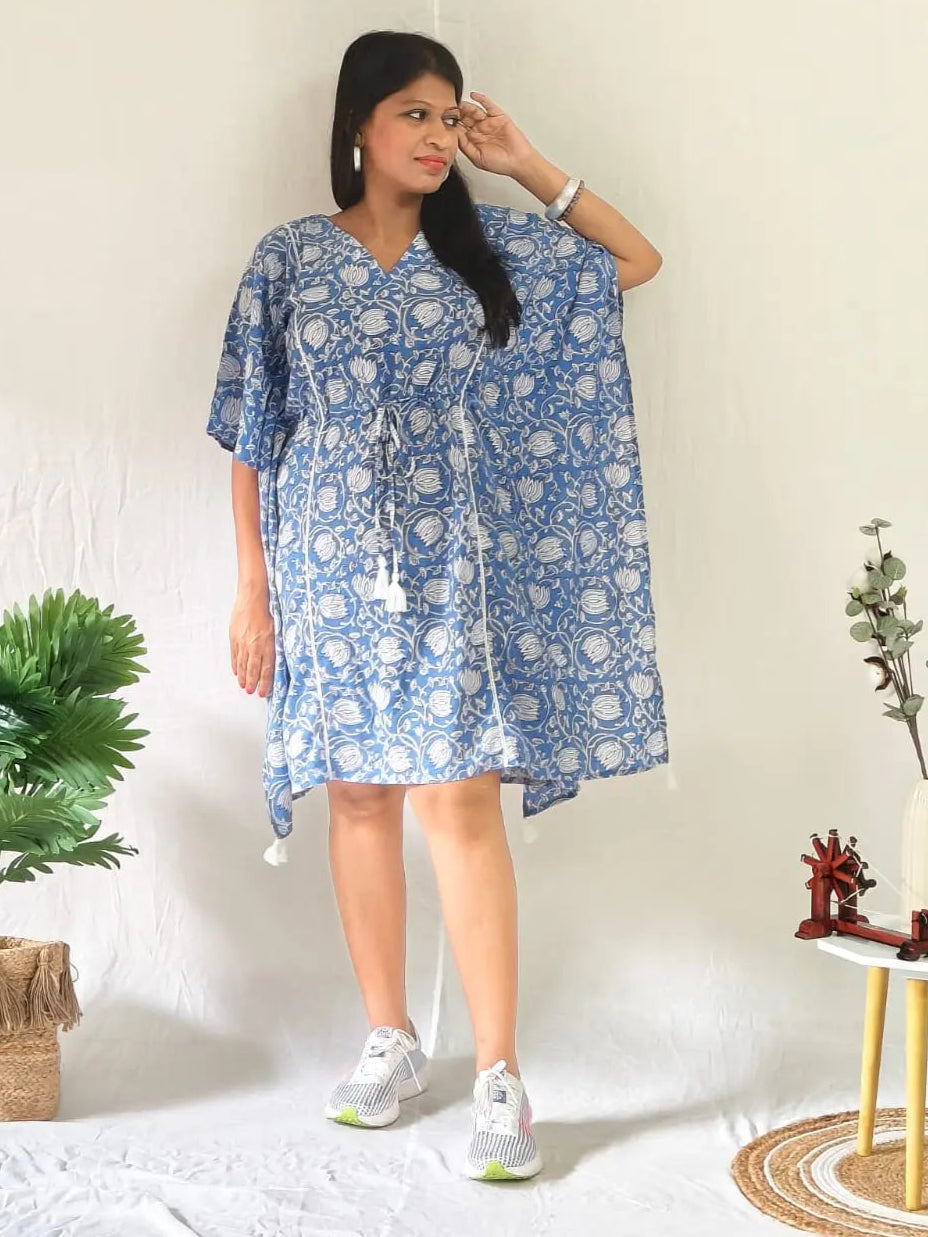 Front view of blue block print kaftan styled in a casual look.