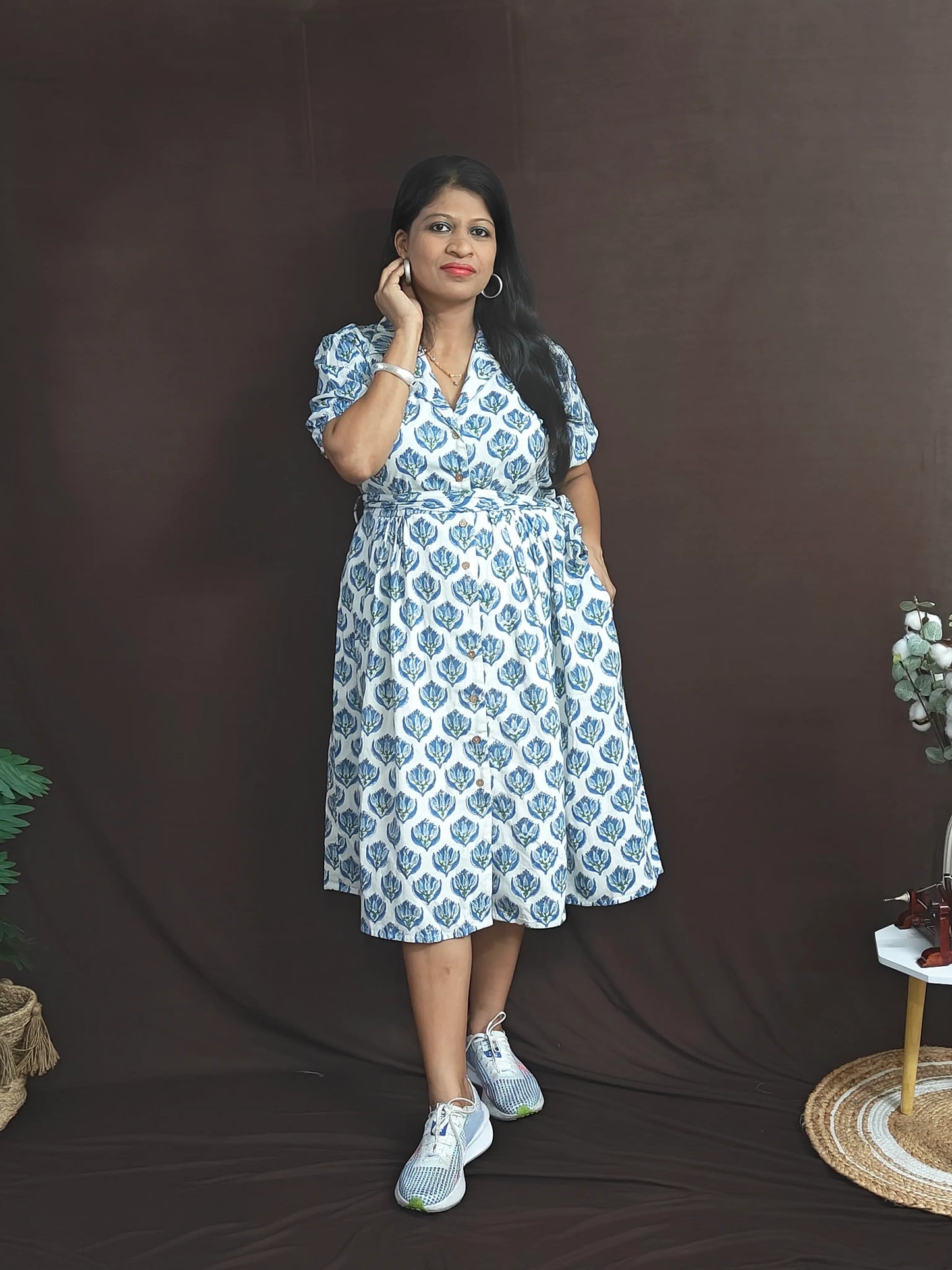 Handcrafted white dress with blue blockprint, side pockets, and notched collar detail